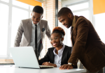 Expats who send money to Ghana via ace money transfer working at office